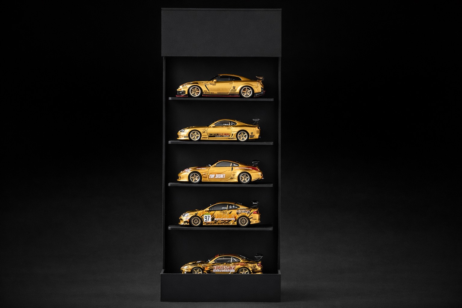 Wall-mounted display case for model cars.